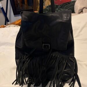 Cut N’ Paste leather fringe backpack